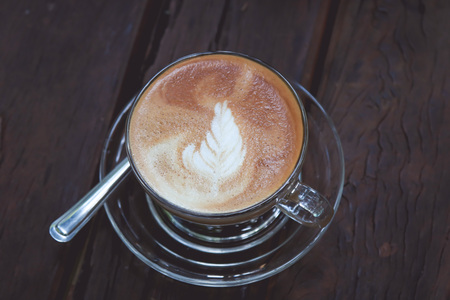 Cappuccino or latte with leaf frothy foamの写真素材