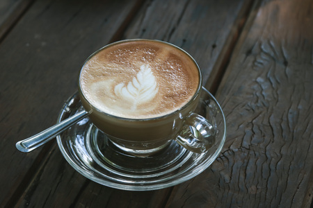 Cappuccino or latte with leaf frothy foamの写真素材