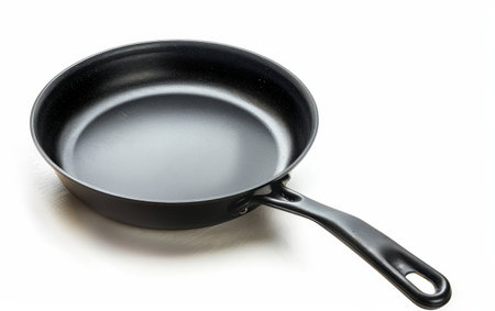Elevating Cooking with the Essential Frying Pan On White Background Generative By Ai.の素材
