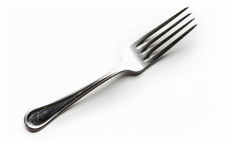 Elevating Culinary Efficiency with the Classic Fork On White Background Generative By Ai.の素材