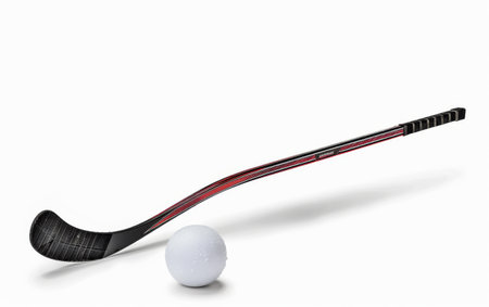Navigating Stickhandling Excellence with Hockey Ball On White Background Generative By Ai.の素材