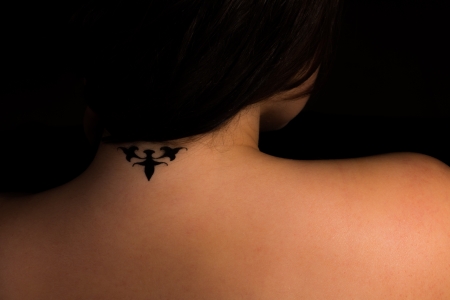 Beautiful female with tribal tattoos の写真素材