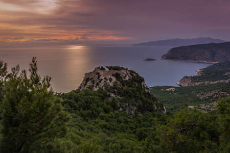 A sunset view of Monolithos Castle on the Greek island of Rhodes.の写真素材