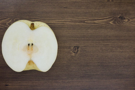 Korean half fruit pear on a wooden table backgroundの写真素材