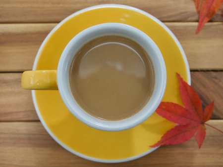 Autumn Coffee and Maple Leafの写真素材