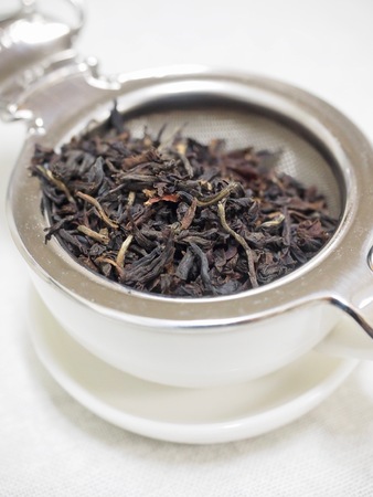 White background black tea leafの写真素材