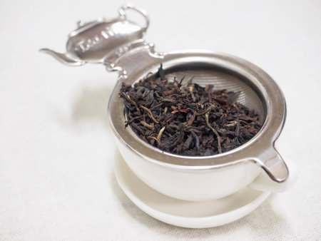 White background black tea leaf