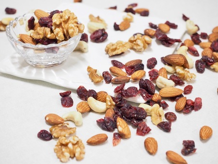 Nut mix, almonds, walnuts, cashew nuts, raspberries,の写真素材