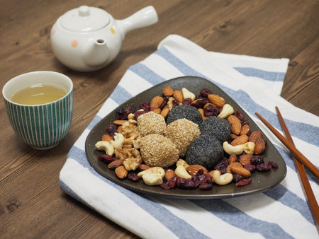 Asian food Sesame glutinous rice cake, Black sesame glutinous rice cake, Nut mix