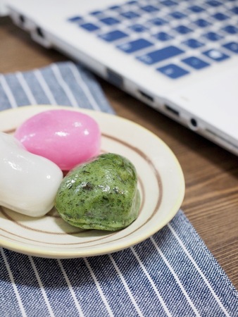 Korean food Songpyeon, Wind tteok, laptopの写真素材