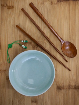 Korean porcelain bowls and spoons, chopsticksの写真素材