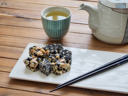 Korean traditional snacks Sweet Rice Puffs, Black sesame gangjeong, Peanut gangjeongの写真素材