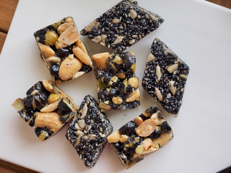 Korean traditional snacks Sweet Rice Puffs, Black sesame gangjeong, Peanut gangjeongの写真素材