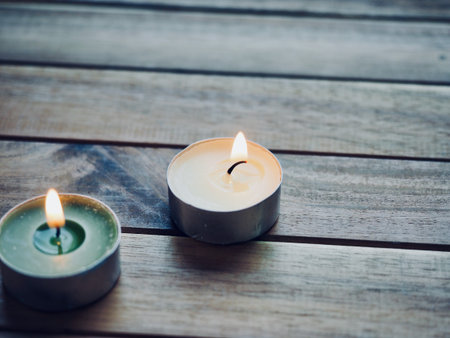 Wooden boards and scented candlesの写真素材