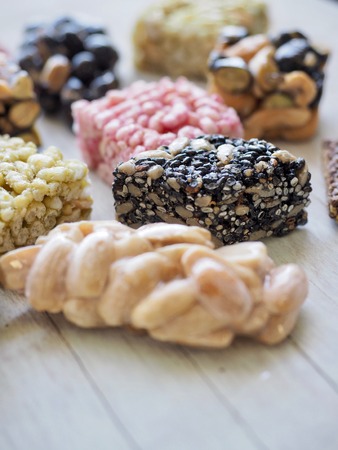 Korean traditional snacks Sweet Rice Puffs, Black sesame gangjeong, Peanut gangjeongの写真素材