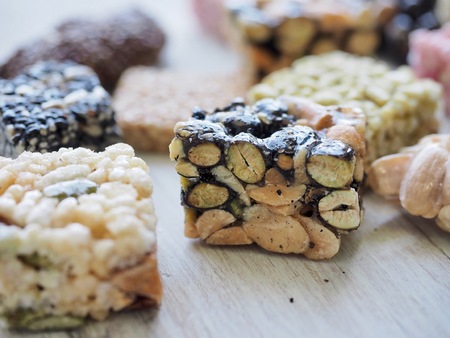 Korean traditional snacks Sweet Rice Puffs, Black sesame gangjeong, Peanut gangjeongの写真素材