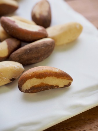 Brazilian nuts and glass bowlの写真素材