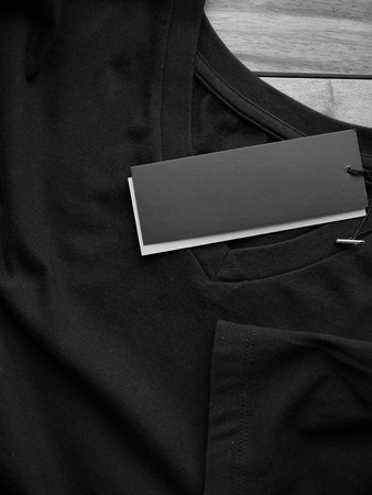 Black V-neck Short Sleeve T-shirt and clothing labelの写真素材