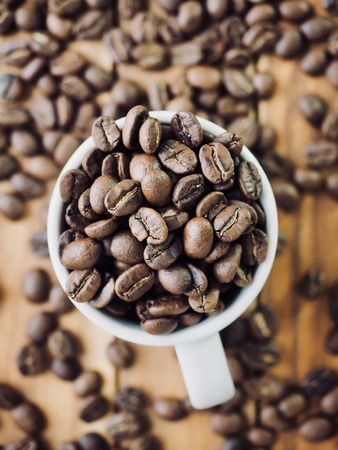 White espress cup and coffee beansの写真素材