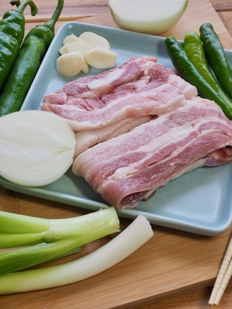 Korean food pork belly and vegetables, Samgyeopsalの写真素材