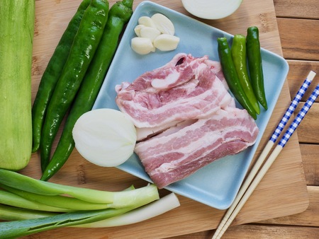 Korean food pork belly and vegetables, Samgyeopsalの写真素材