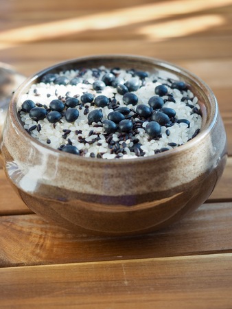 Korean food black rice in a stone potの写真素材
