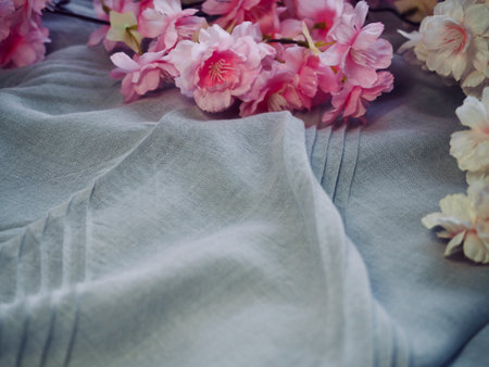 cherry blossoms and cotton fabric background