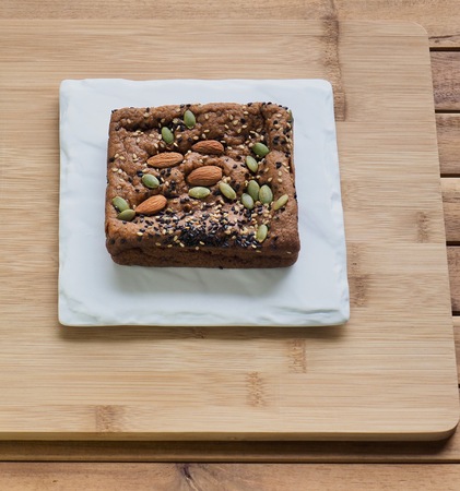 Almonds and pumpkin seed plus breadの写真素材