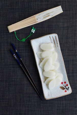 Korean food, Bar rice cake and folding fanの写真素材