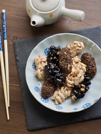 Korean traditional snacks Sweet Rice Puffs, Black sesame gangjeong, Peanut gangjeongの写真素材
