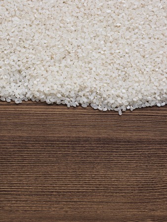 White rice with wooden boardの写真素材