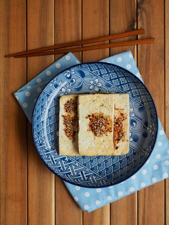 Asian food grilled tofu and soy sauceの写真素材