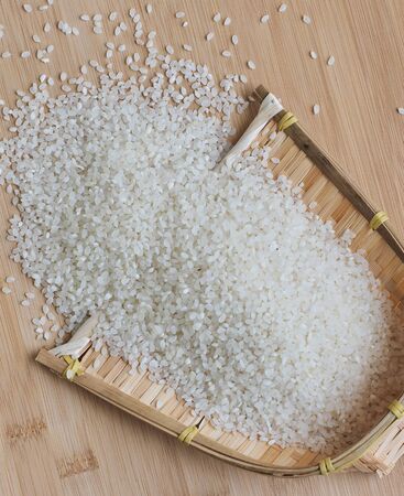 White rice with wooden board, Asian food white riceの写真素材