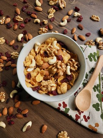 Spoon with cereal and nut mixの写真素材