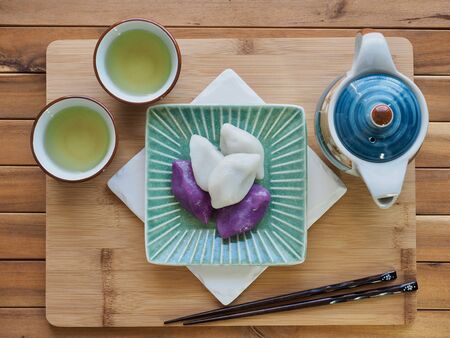 Korean food Songpyeon, half-moon-shaped rice cake with green teaの写真素材