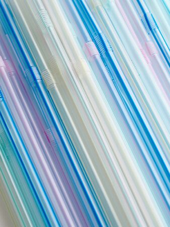 Straws in various colors, backgroundの写真素材