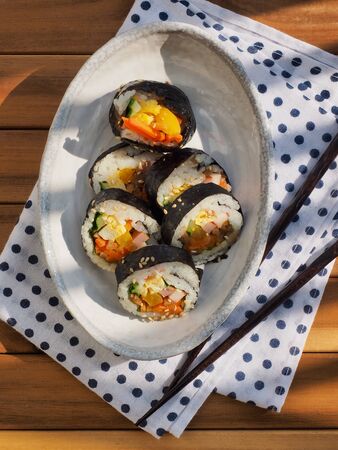 Korean food Vegetable Kimbab in Porcelain Bowlの写真素材