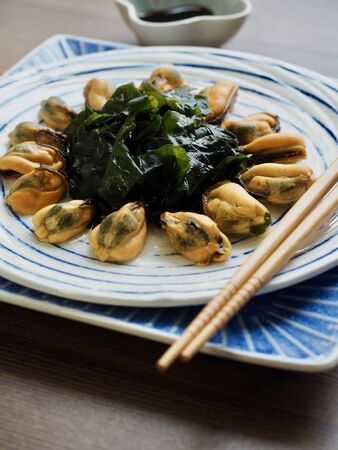 Asian food mussels and seaweed and soy sauceの写真素材