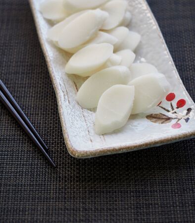Korean food, Bar rice cake and folding fanの写真素材