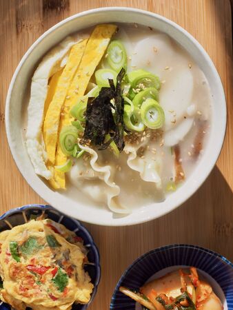 Korean traditional food Sliced ??Rice Cake Soup, Tteok and dumpling soupの写真素材