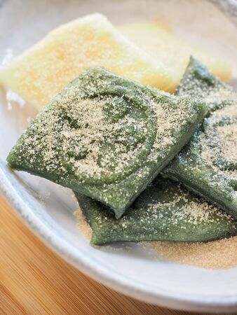 Korean traditional food jeolpyeon, pounded rice cake Sugar powder and Walnutの写真素材