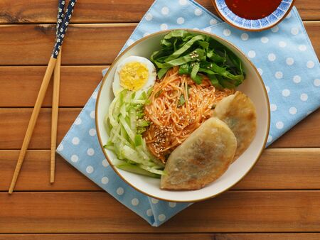 Korean food Bibim noodles, Bibim guksu and dumplingの写真素材