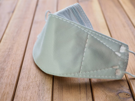 Wooden board and white mask