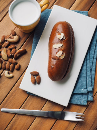 Fresh round Chocolate Cream bread and milk
