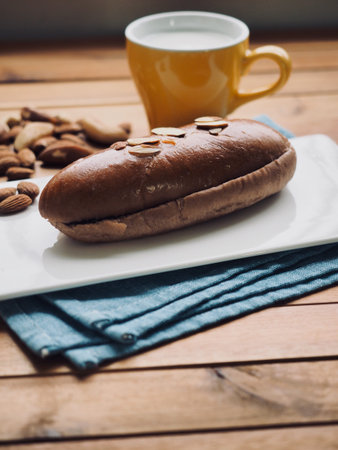 Fresh round Chocolate Cream bread and milk