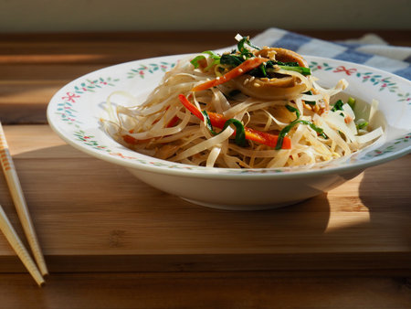 Asian food stir-fried rice noodles with vegetables
