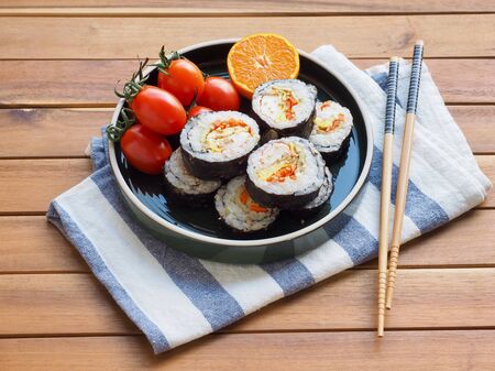 Korean food Vegetable kimbap and Cherry Tomato, Tangerineの写真素材