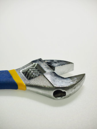 White background with monkey spanner, tool