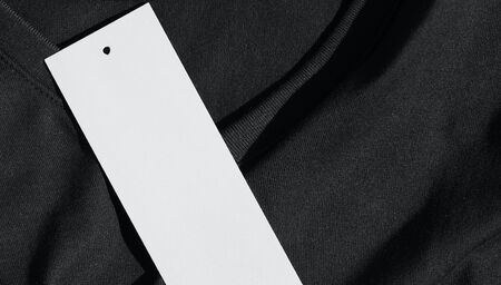 Black V-neck Short Sleeve T-shirt and clothing labelの写真素材