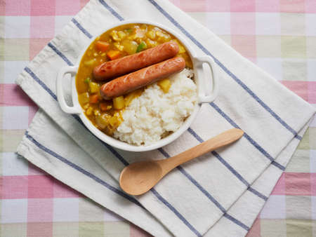 Asian food sausage curry riceの写真素材
